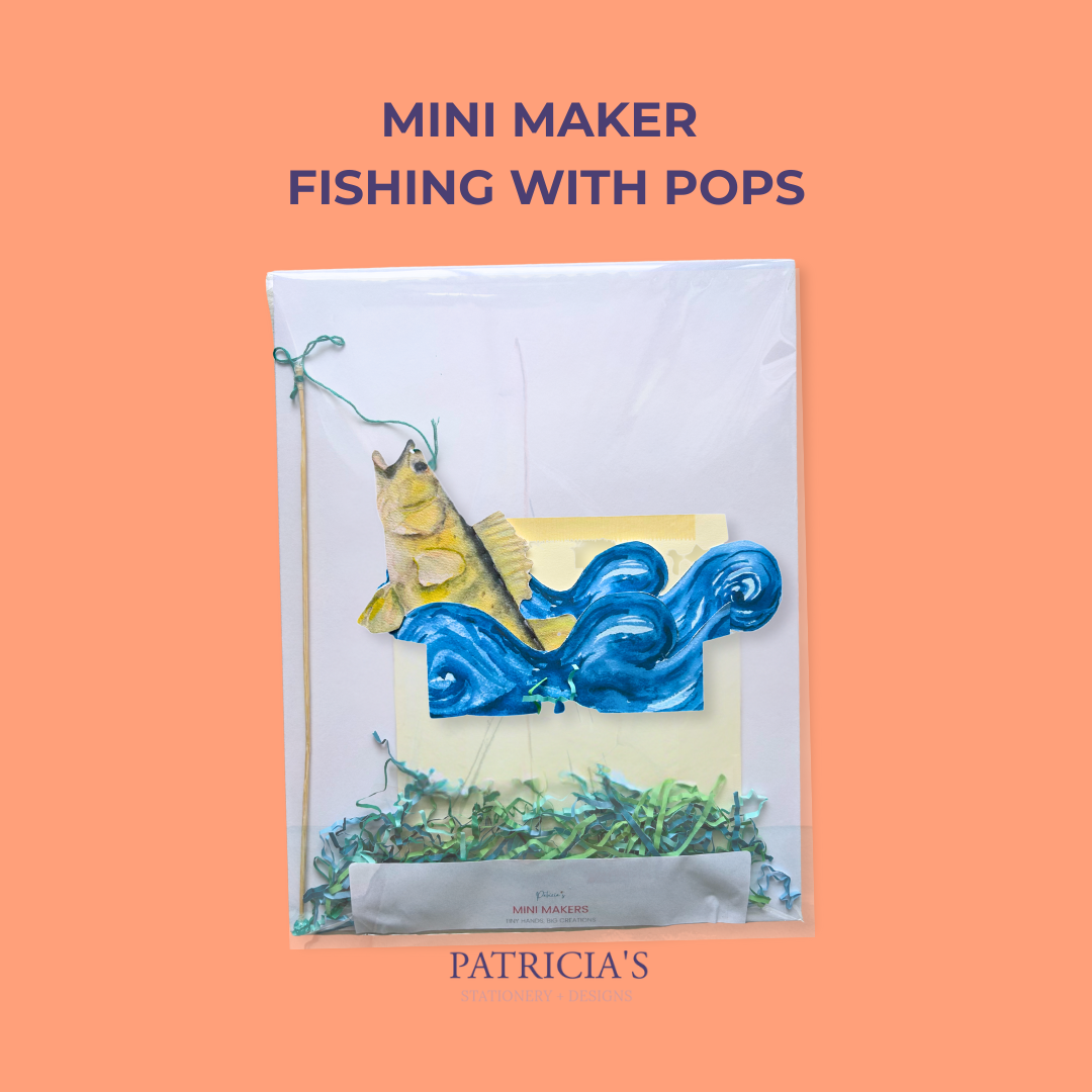 Flat Lay of Mini Makers DIY paper kits with cut-out pieces, envelope, inside package